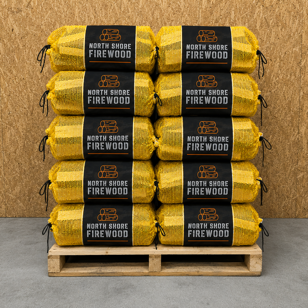 Stack of North Shore Firewood of beech firewood nets on a wooden pallet against a wooden background