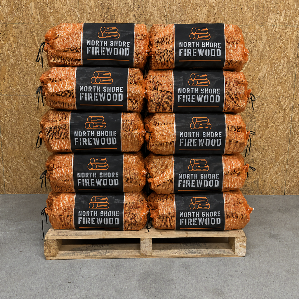 Stack of North Shore Firewood Hornbeam nets on a pallet against a wooden background
