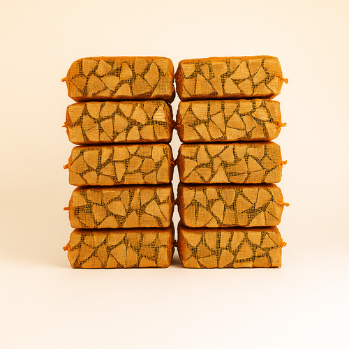 Stack of firewood with a geometric pattern on a beige background