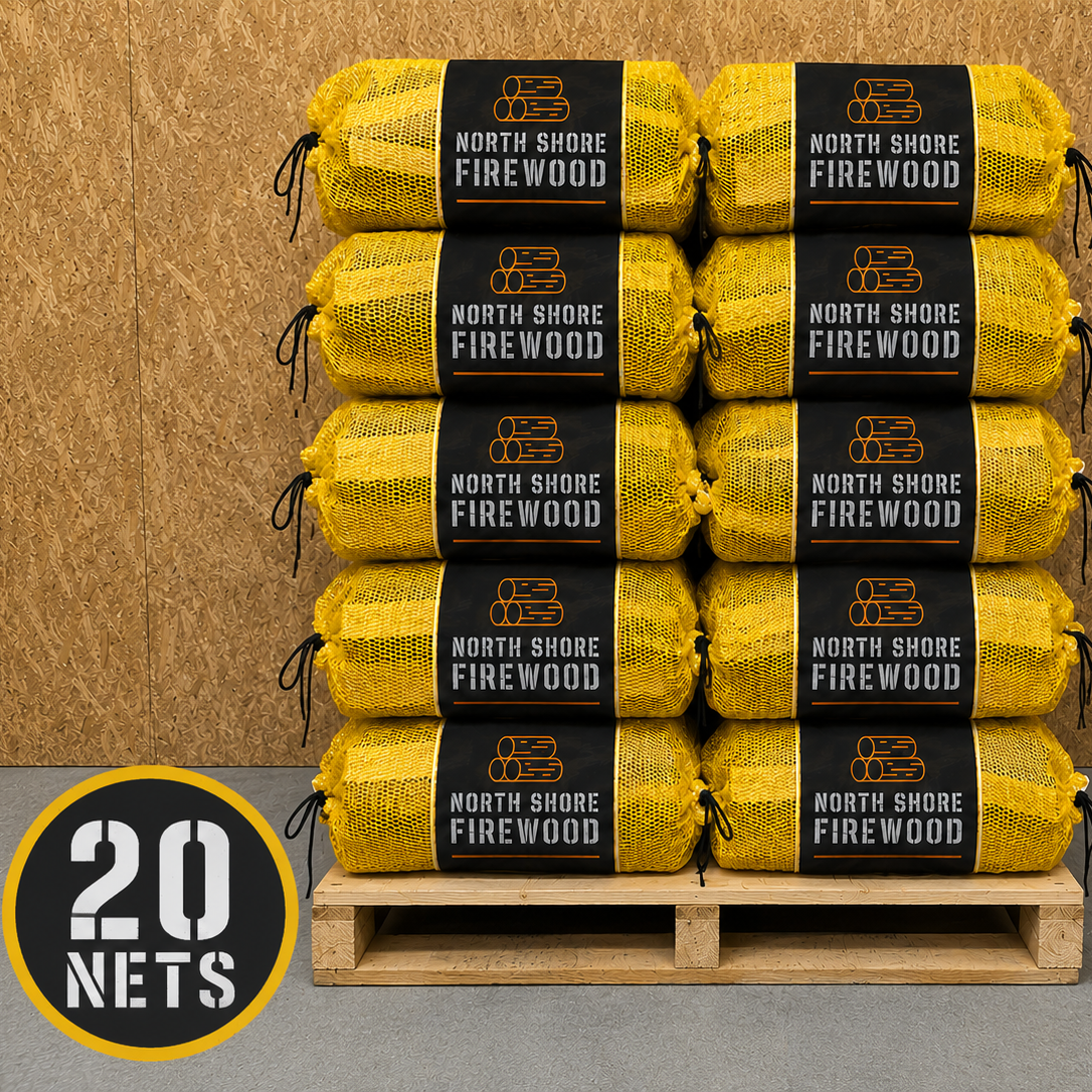 Stack of North Shore Firewood packages on a pallet with a wooden background