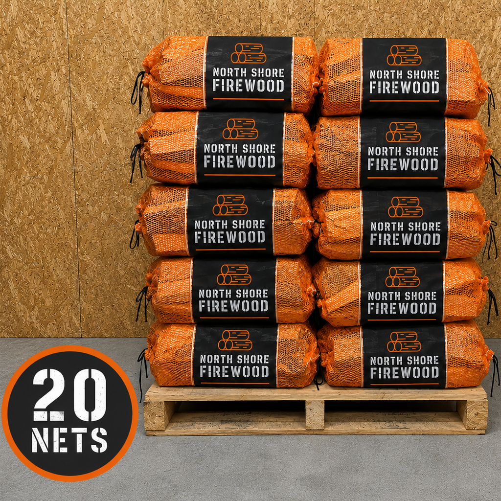 Stack of North Shore Firewood packages on a pallet with a wooden background