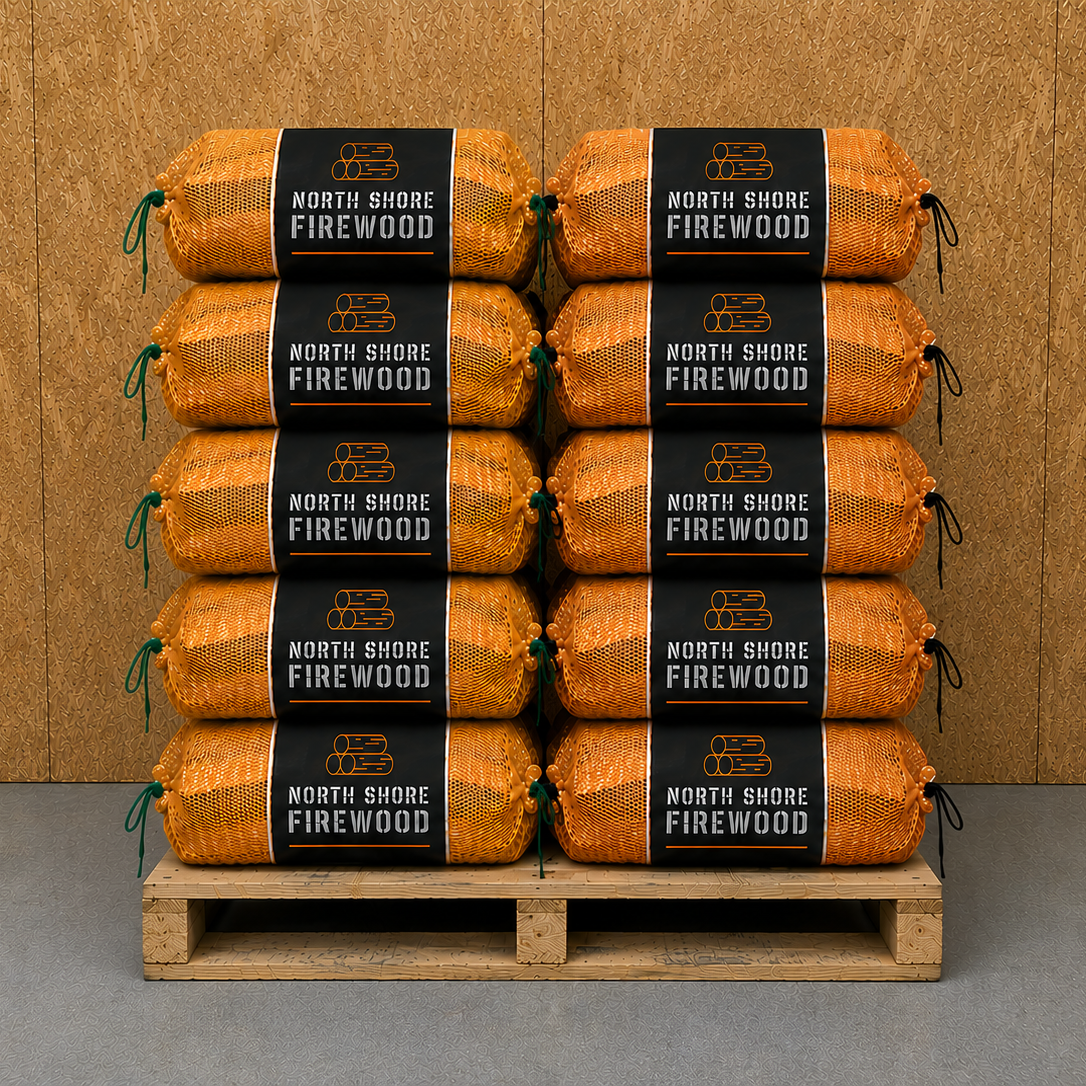 Stack of North Shore Firewood packages on a wooden pallet against a brown background