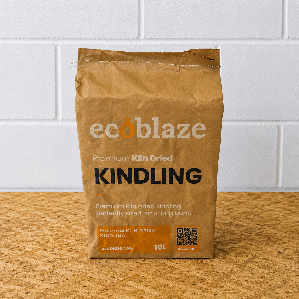 Bag of ecoblaze Kindling on a wooden surface with a white tiled wall background
