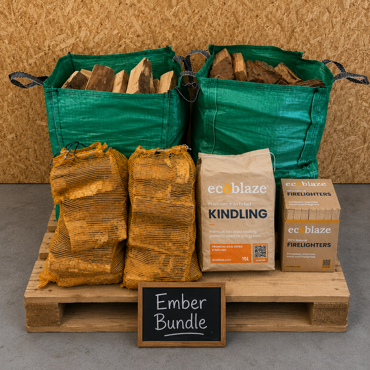 Wooden pallet with bags of wood, kindling packages, and a sign labeled 'Ember Bundle' against a wooden background.
